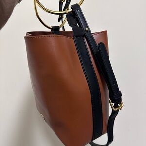 Chic Tan and Black Women's leather Shoulder Bag with gold handles
